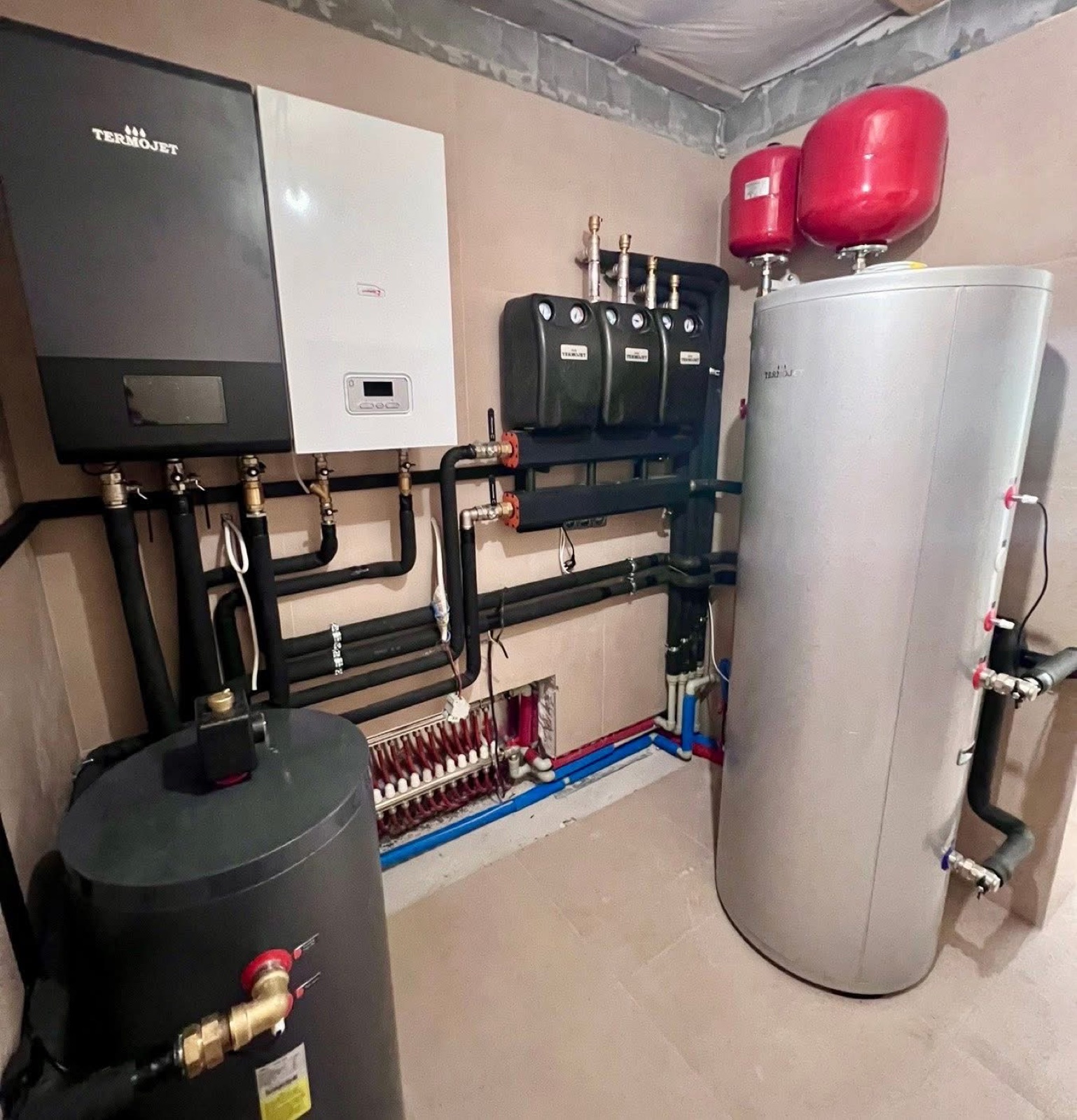 Breaking free from gas: the «boiler + heat pump + buffer» hybrid